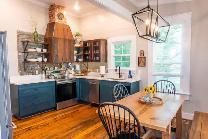 Farmhouse kitchen remodel with reclaimed wood and custom range hood